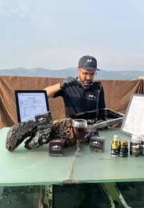 Elasna team processing Himalayan Shilajit resin with quality testing and product preparation setup