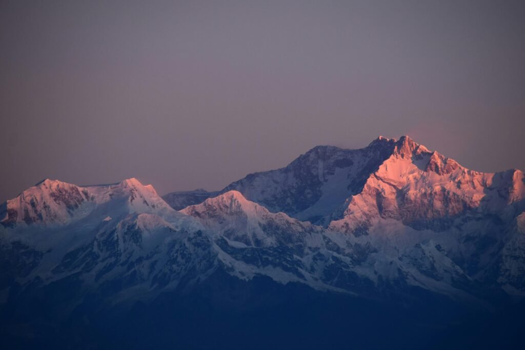 pexels-photo-933054-933054 Breathtaking sunset view of snow-capped mountains in Nepal, perfect for scenic backgrounds.